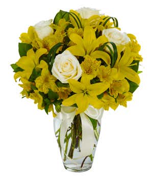 Yellow Asiatic lilies, white roses and yellow alstroemeria bouquet