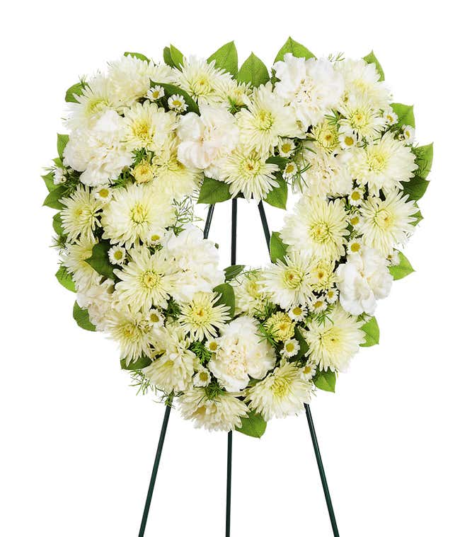 Heart shaped white flower funeral standing spray