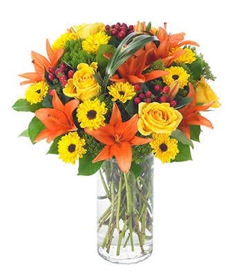 Orange lilies, yellow roses and yellow daisies