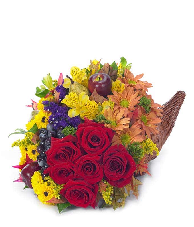 Classic Thanksgiving cornucopia hand delivered by a florist with fresh flowers