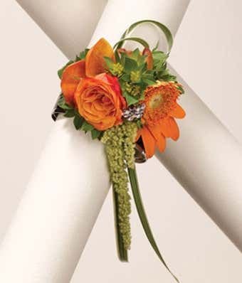 Orange flower wrist corsage