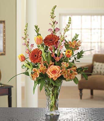 Orange and yellow tulips with snapdragons