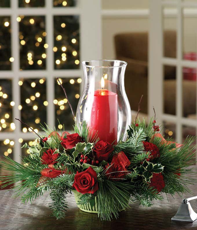 Holiday Centerpiece with red flowers and candle