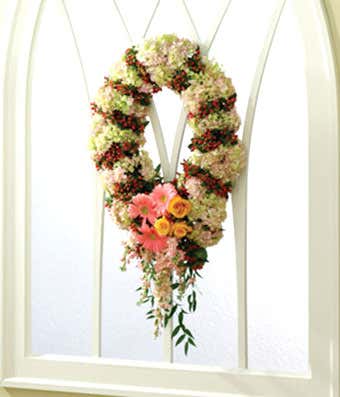 Floral wreath with hydrangea, hypericum and daisies
