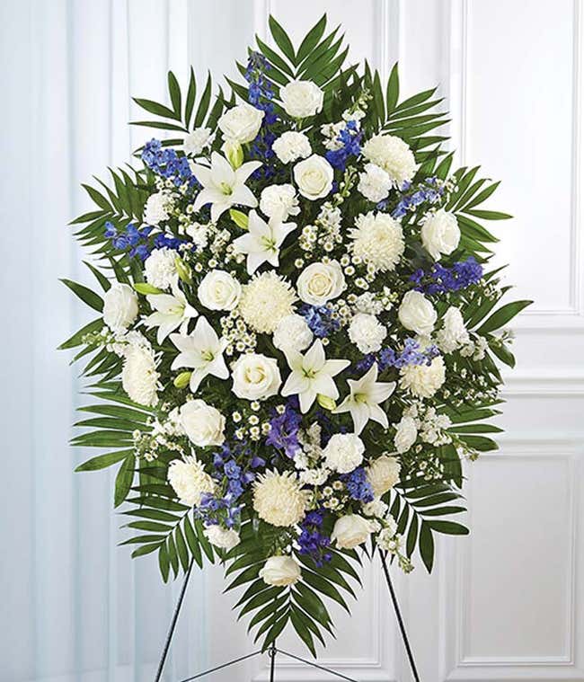 Blue delphinium and white flower standing spray