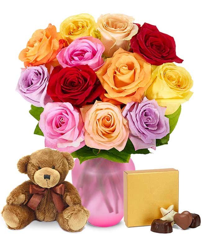 Mixed roses, teddy bear and chocolates