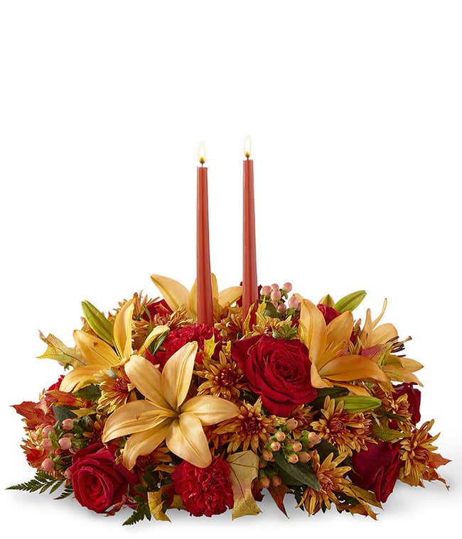 Red rose centerpiece with candles