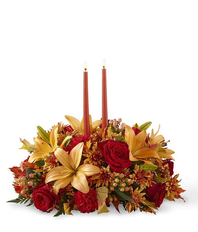 Red rose centerpiece with candles