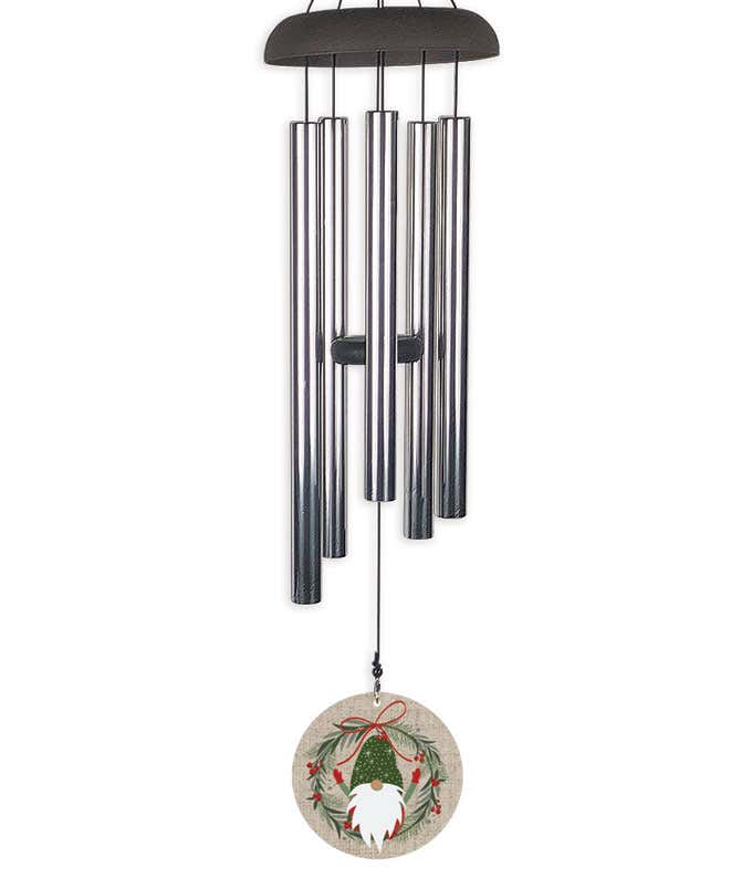 Wind chime with a Christmas themed gnome, circled by a wreath.